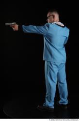MIKAEL BLUESPY WITH TWO GUNS